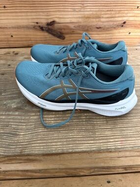 Asics mens Teal Athletic Running Shoes with Gold Logo Accents